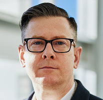 Alexander Hughes, CEO de uma empresa de trading de criptomoedas, retrato